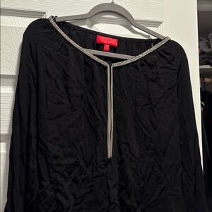 Jennifer Lopez Elegant Black Top with Silver Details